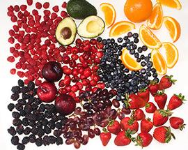 Black plums, blackberries, raspberries, strawberries, sweet cherries, avocado, navel orange, and red grapes. 