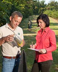 Two scientists with an insect trap