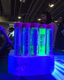 Test tubes viewed under a blacklight